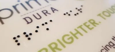 primaDURA-Glow-Braille-220x220