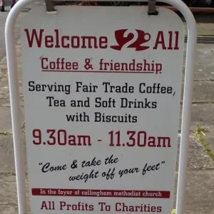 Welcome 2 all Cafe street sign