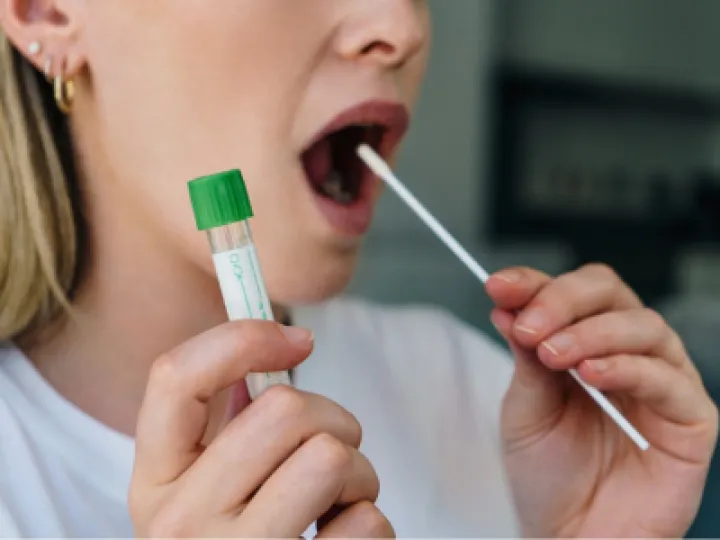 Woman Taking A Lateral Flow Test