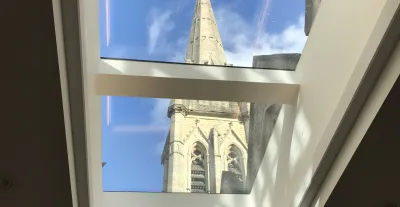 Spire through skylights