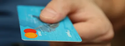 Person Holding Debit Card