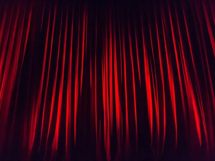 Red stage curtain in a theatre