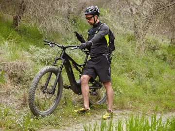 Young professional rider dressed in cycling
