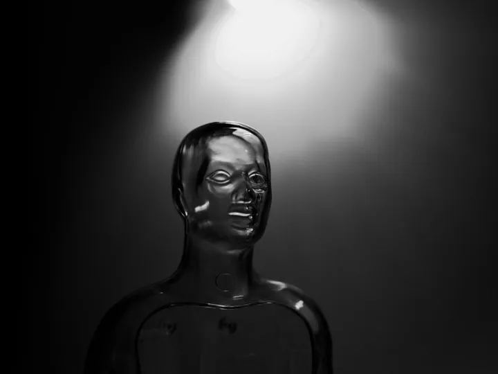 A futuristic transparent mannequin illuminated by