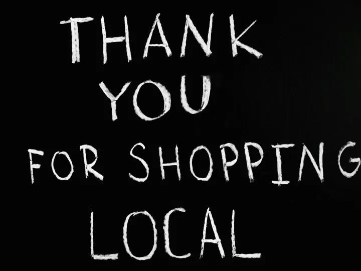 A chalkboard with handwritten message thanking