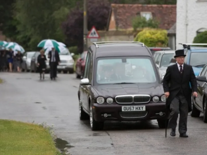 Les Stocker's Funeral 01