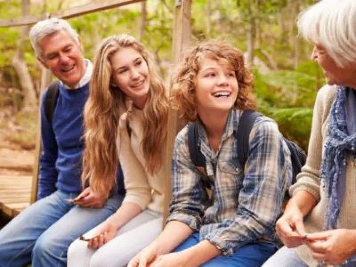 bigstock-Grandparents-and-teens-sit-on-101713286-700x467
