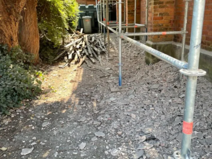 Removing the old wattle and daub roof