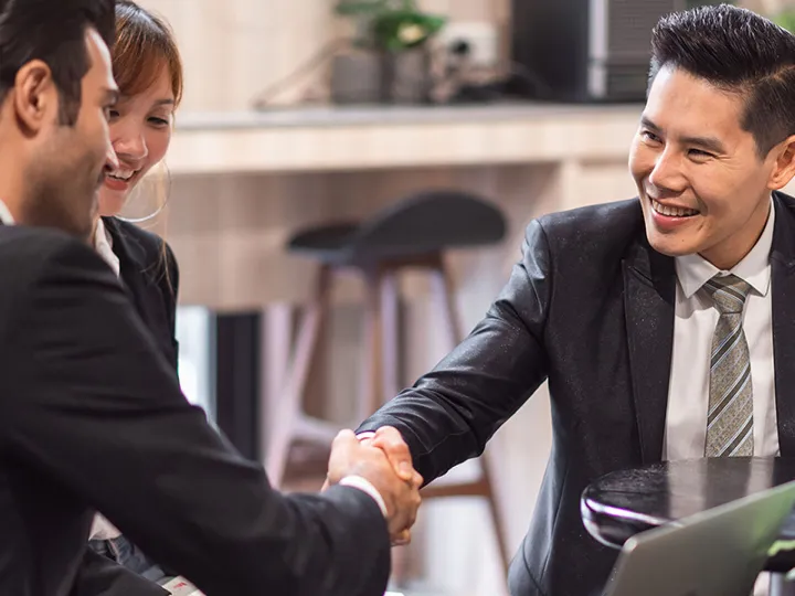 Confident startup founder reviewing financial strategy