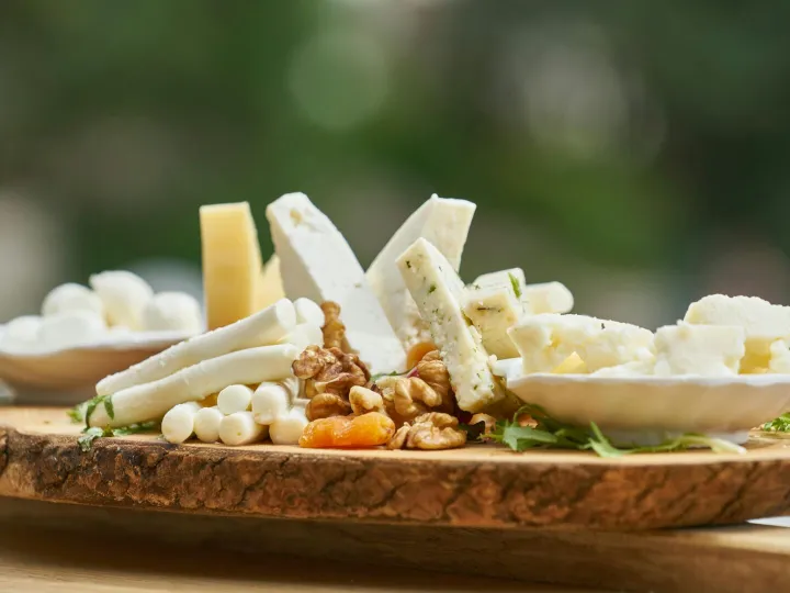A delicious assortment of cheese and nuts on a