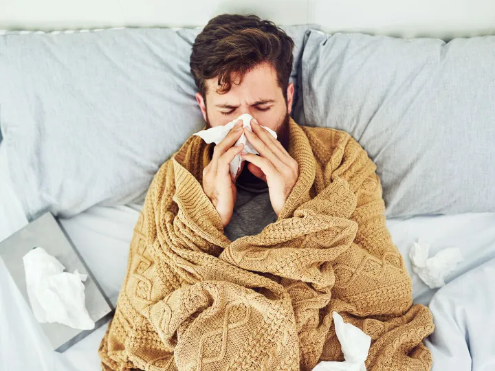 Man in Bed With Flu