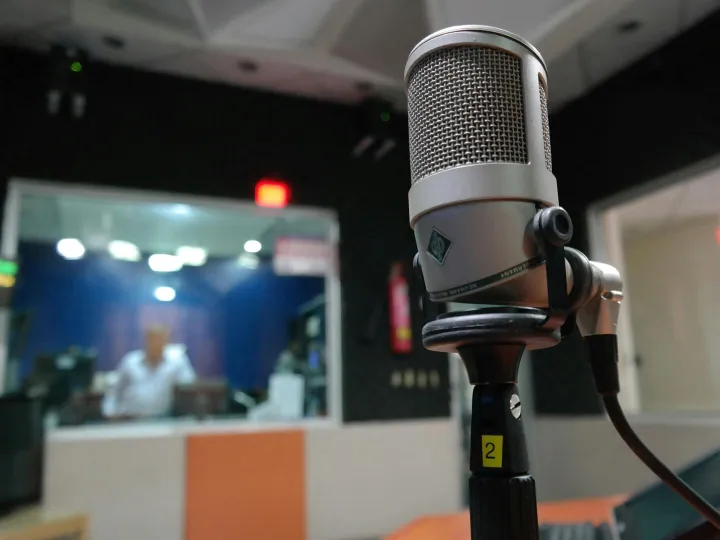 Close-up of a microphone in a recording studio wit